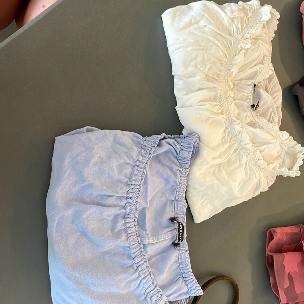 Purple and White longsleeve off shoulder crop tops from Brandy Melville